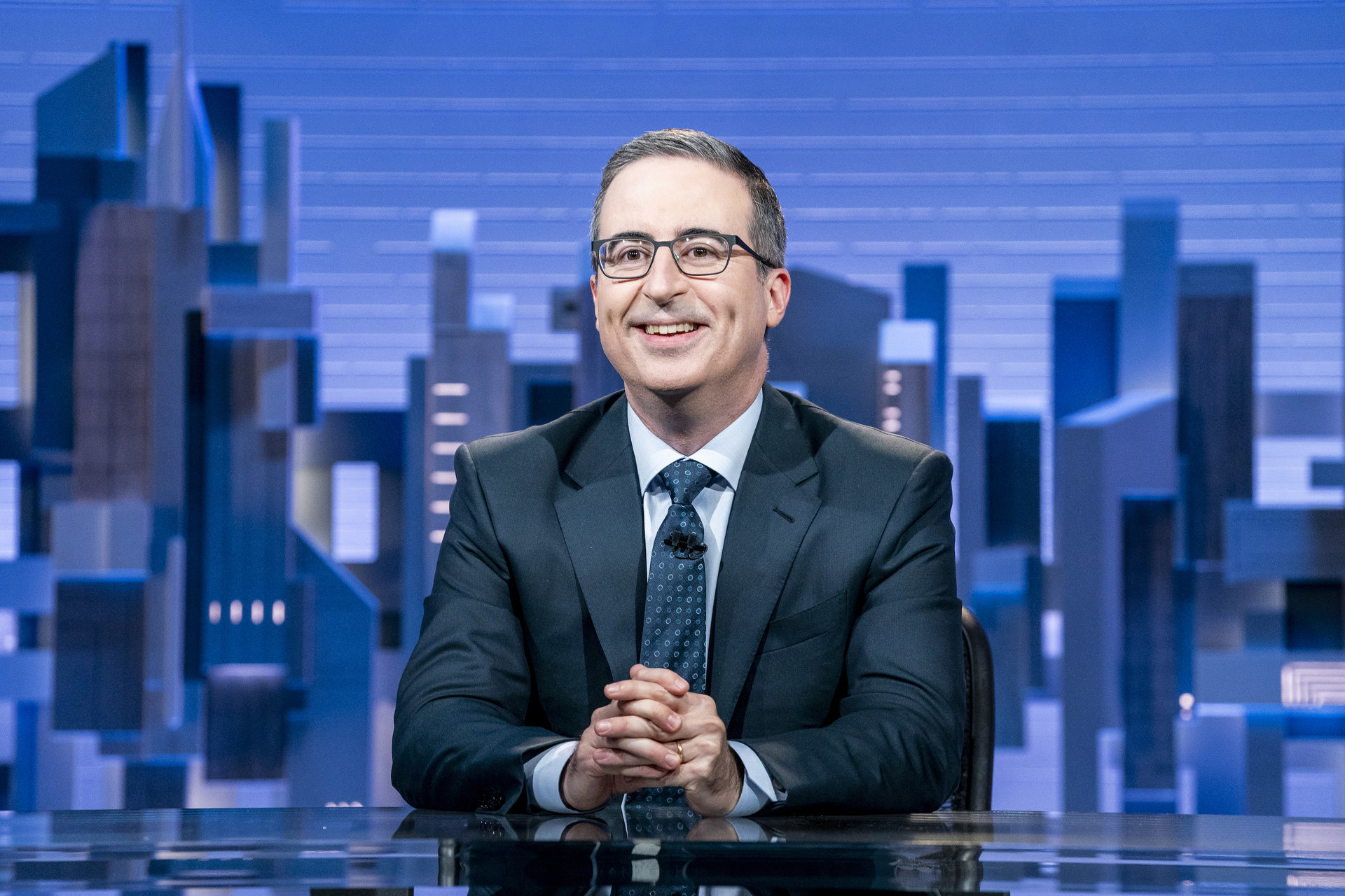 John Oliver at his desk on &quot;Last Week Tonight With John Oliver&quot;