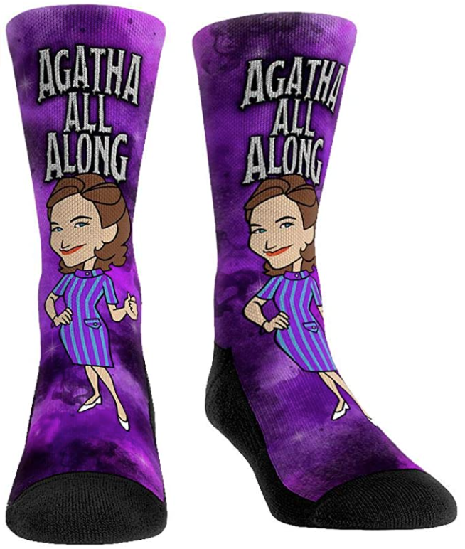 Tall socks with a cartoon print of Agatha and the text agatha all along on the front