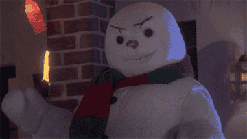 Scary snowman waves his arms