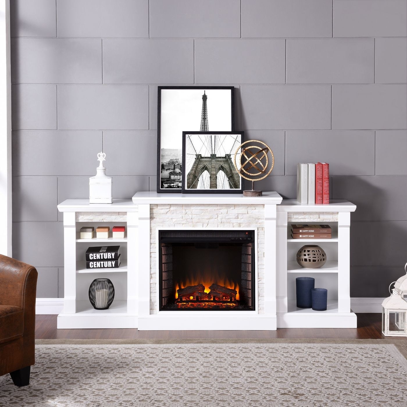 White and stone fireplace with bookshelves