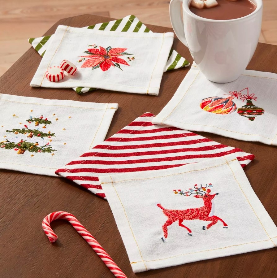 six cocktail napkins with holiday embroidery
