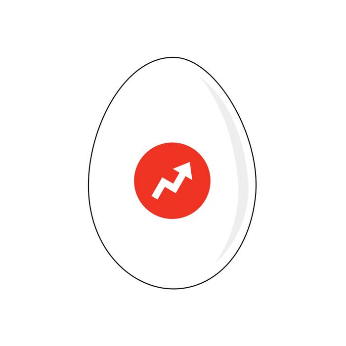 White chicken egg on white background with BuzzFeed logo.