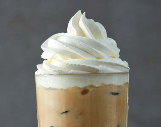 An iced white chocolate mocha with whipped cream