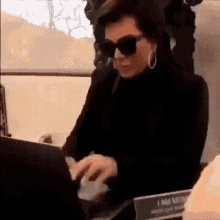 Kris Jenner being frustrated at a broken computer.