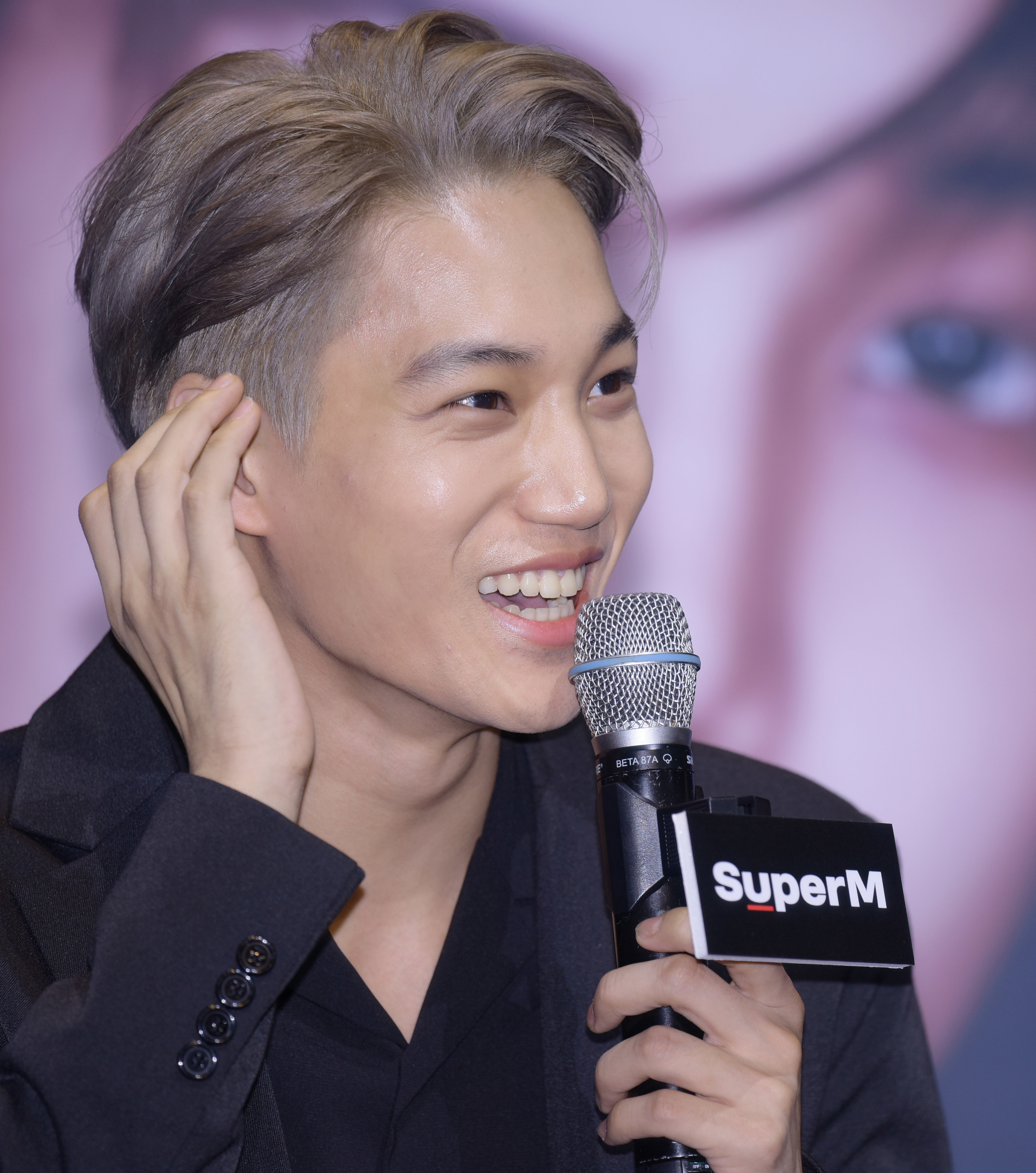 Kai speaking at an event