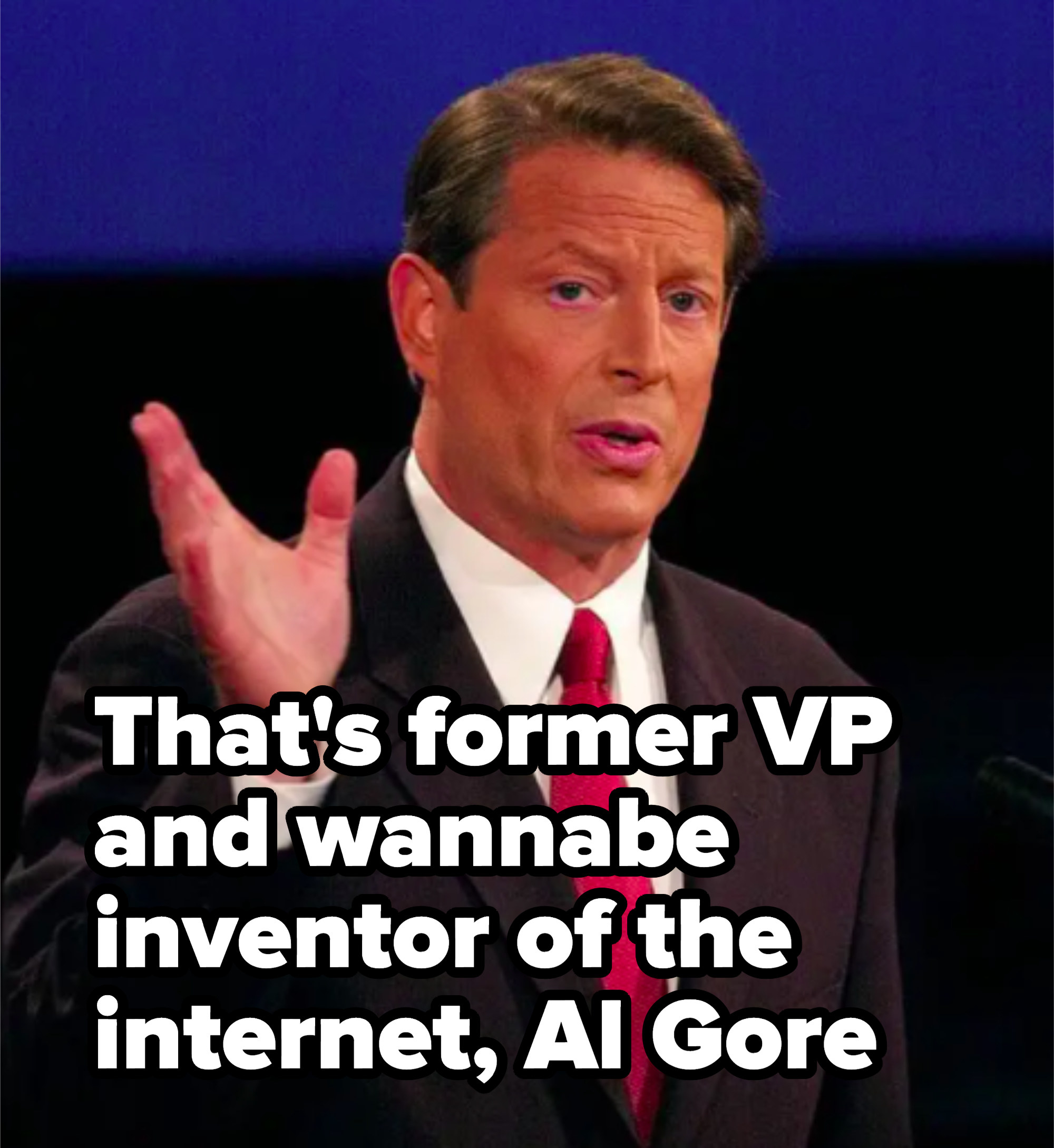Al Gore in a suit at a debate