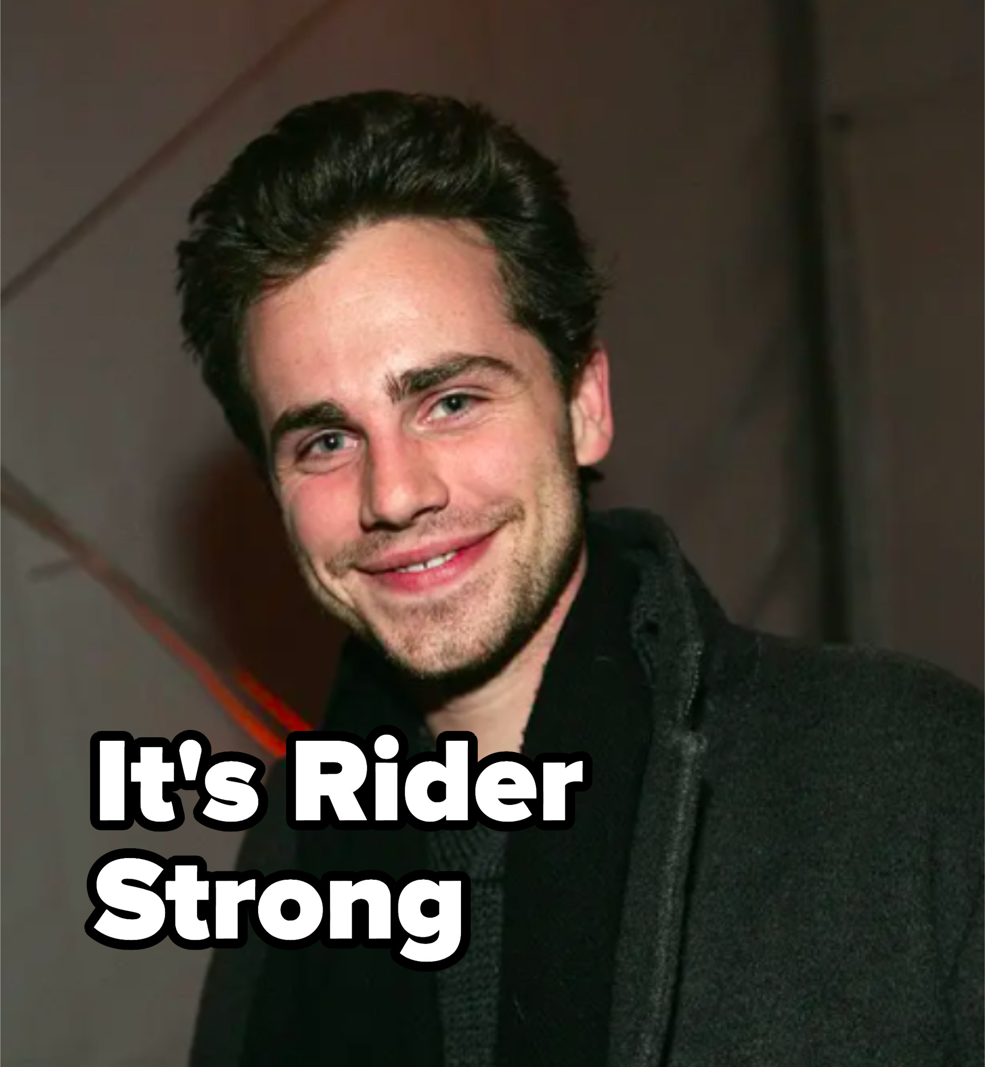 rider strong with some scruff and a big smile