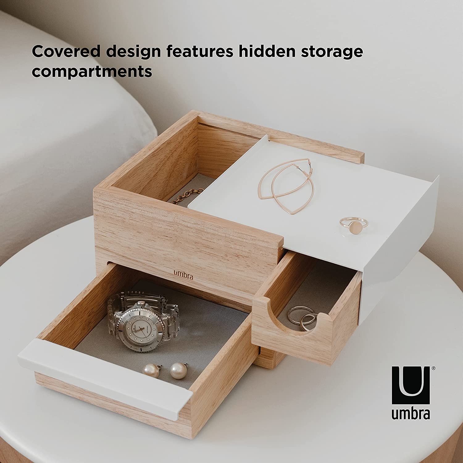 the white/natural mini jewelry box with jewelry in its three compartments