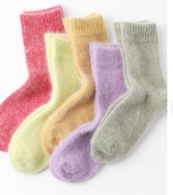 Five pairs of red, green, yellow, purple, and gray wool socks