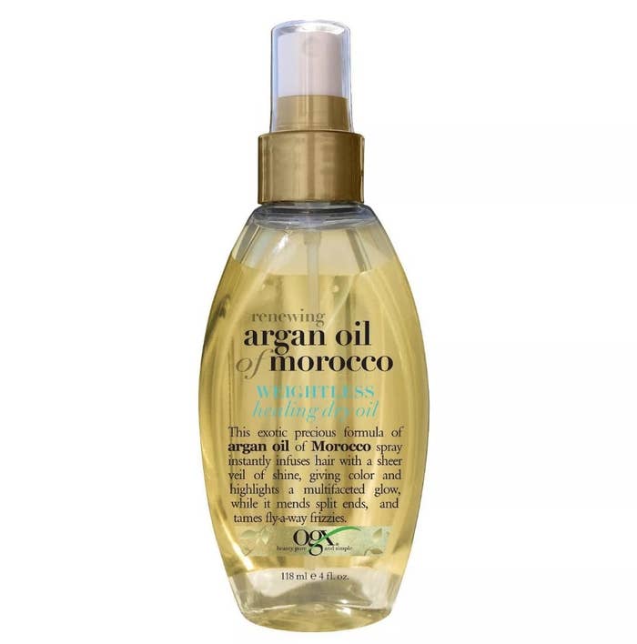 A bottle of renewing argan oil hairspray