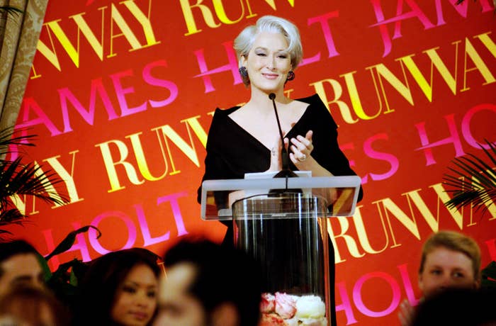 Miranda at the podium during a runway event