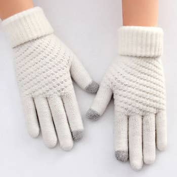 Model wearing the white touchscreen gloves