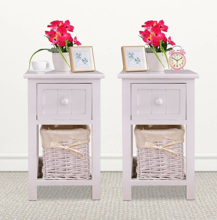 the two white nightstands side by side