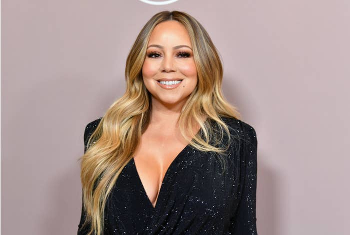 Mariah Carey smiles off-camera