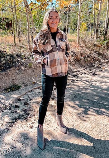 Reviewer wearing the tan and brown plaid shacket