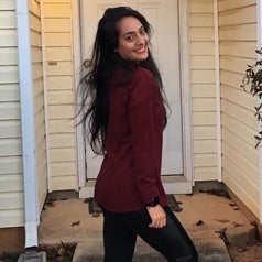 Side of reviewer wearing the maroon henley