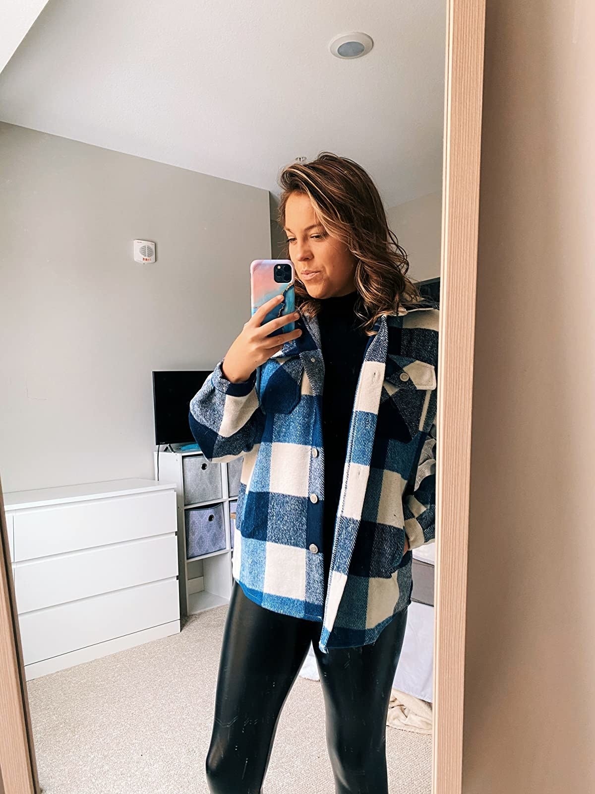 another reviewer wearing the bluish  and achromatic  plaid shacket