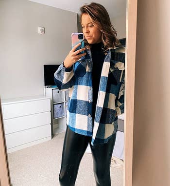Reviewer wearing the blue and white plaid shacket