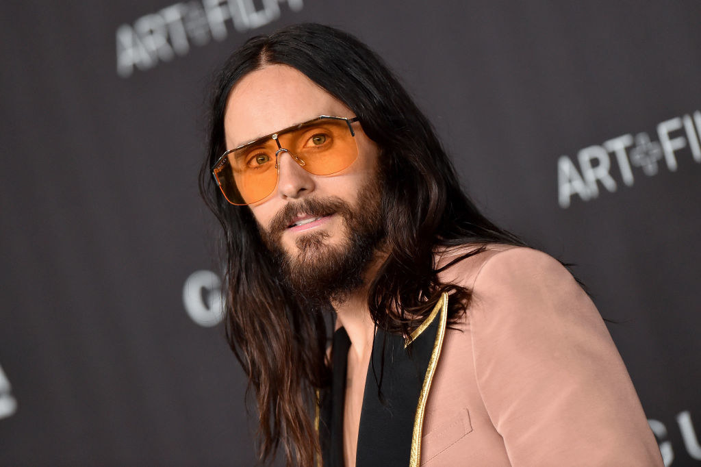 Jared wearing aviator sunglasses on the red carpet