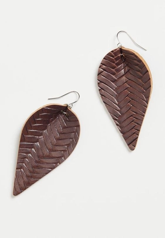 A pair of brown textured faux leather drop earrings