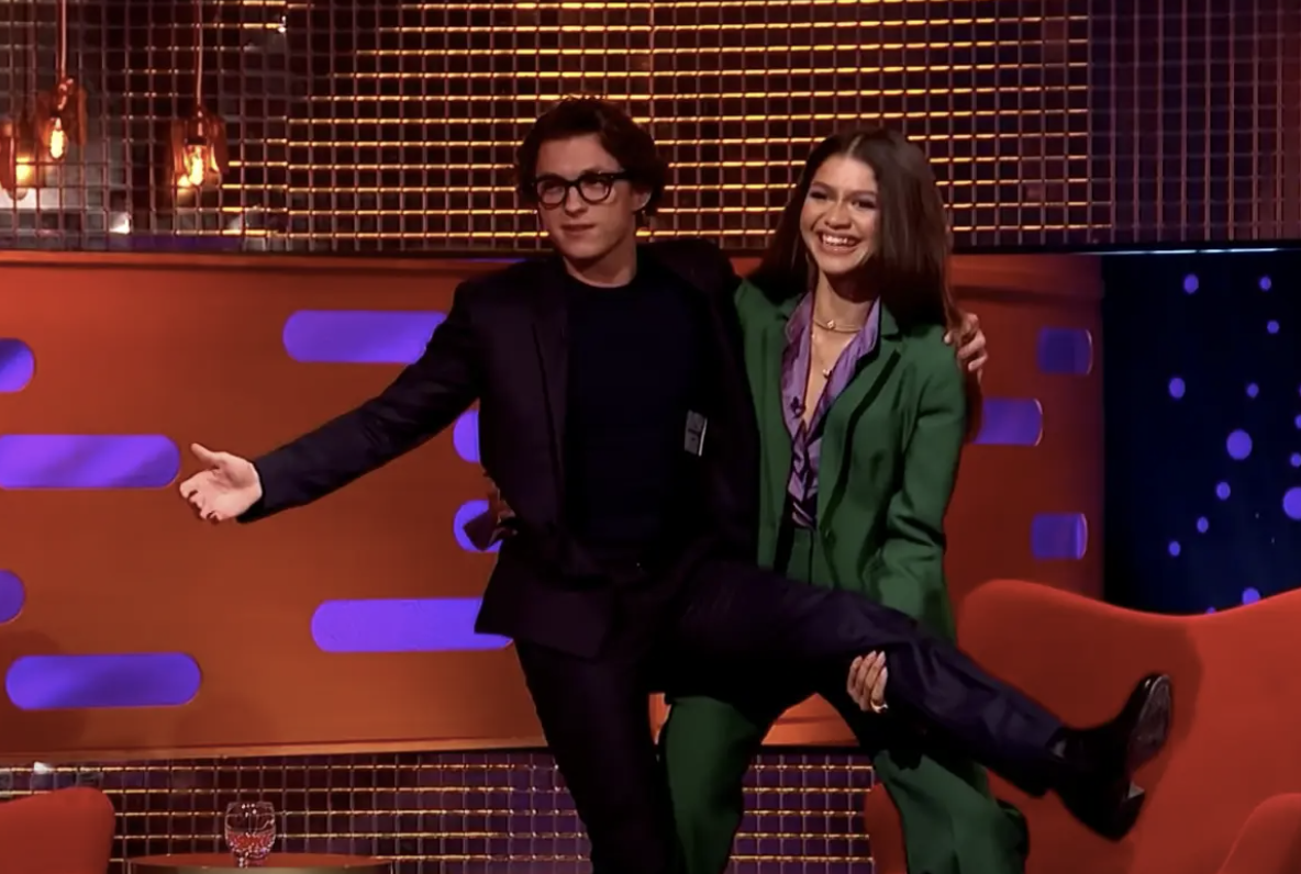 Zendaya catching Tom Holland after a demonstration