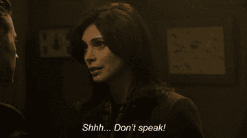 A woman saying &quot;shhh...don&#x27;t speak!&quot;