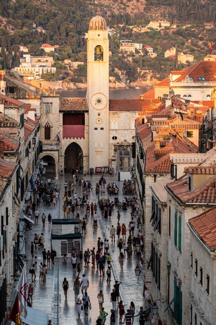 Tourists along the main avenue in the famous Dubrovnik old town in Croatia