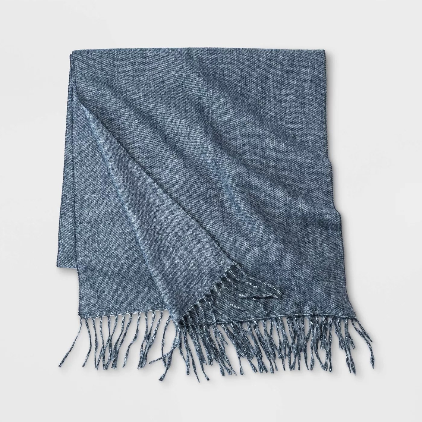 A navy scarf with tassels