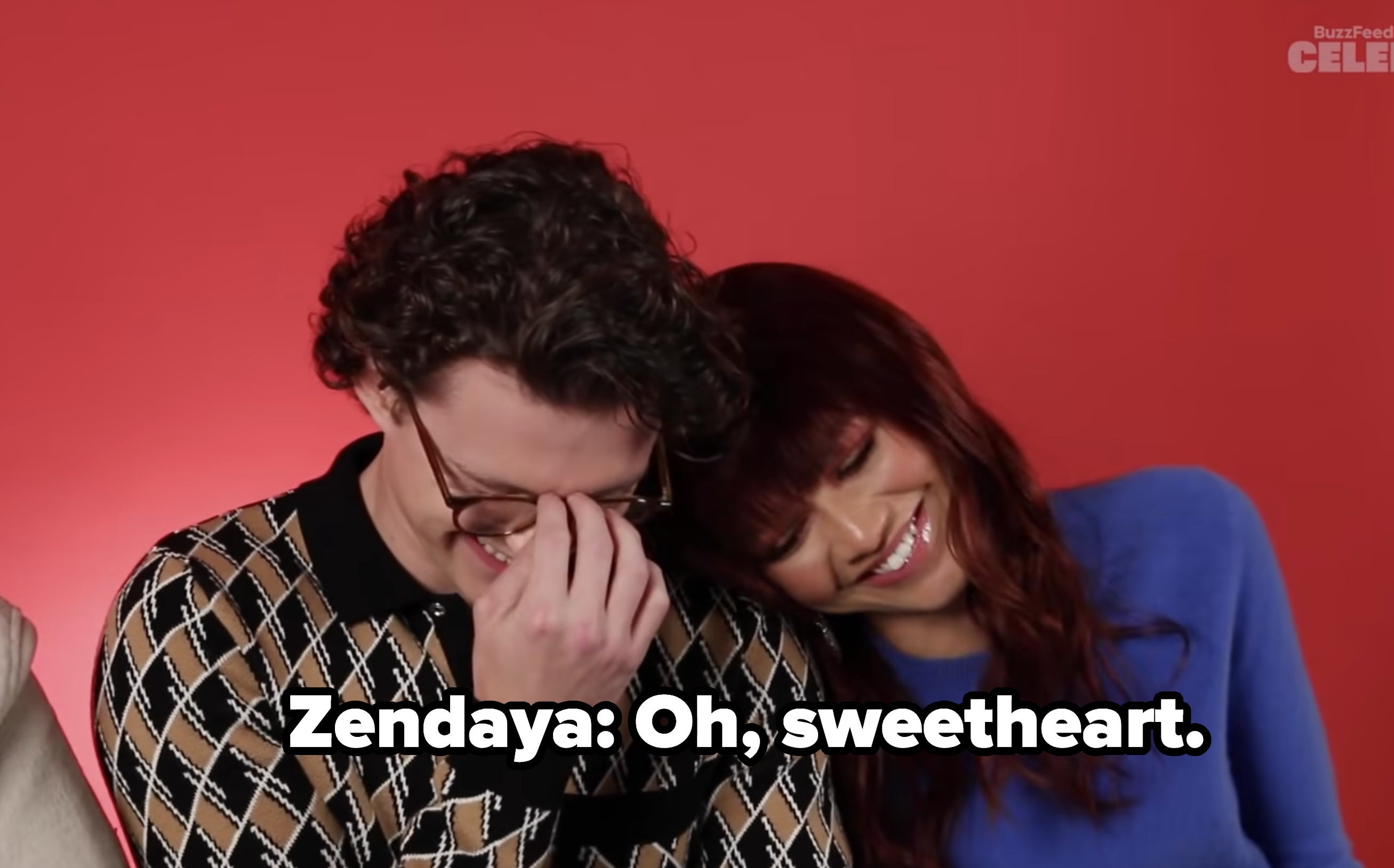 Zendaya resting her head on Tom Holland's shoulder