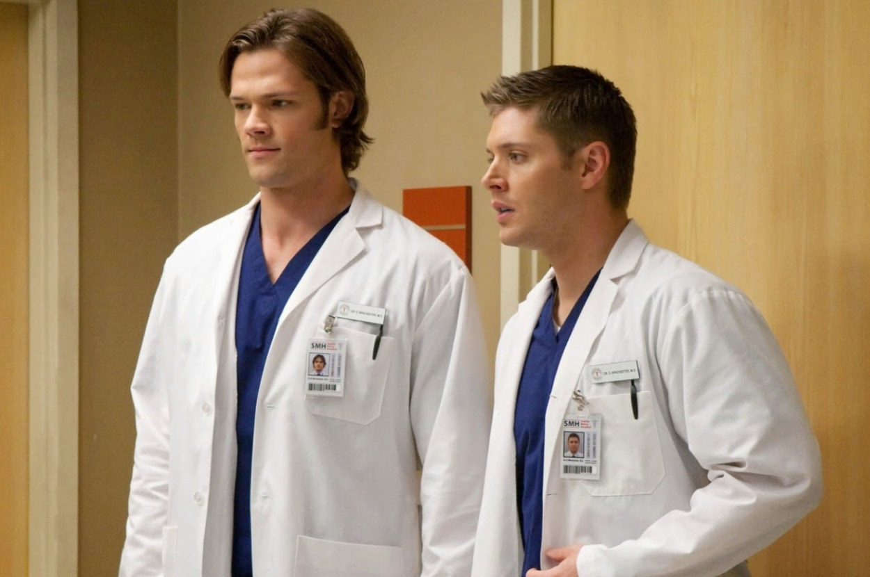 Dean and Sam from Supernatural are pictured in a hospital dressed as doctors