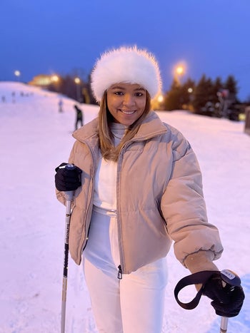 Reviewer wearing the white headband while skiing
