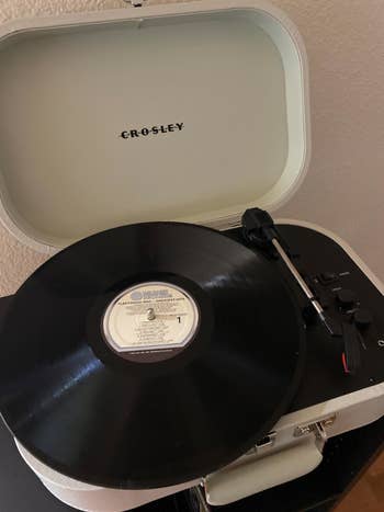 a reviewer's white turntable