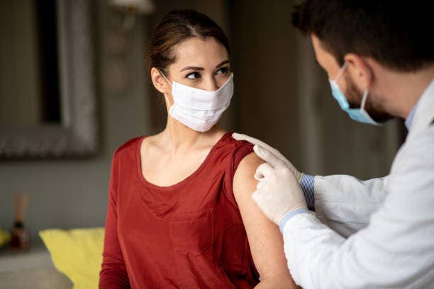 Woman getting a vaccine