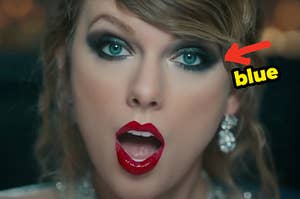 A closeup of Taylor Swift in the Look What You Made Me Do music video with an arrow pointing to one of her eyes and blue typed next to it