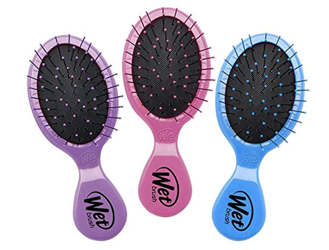 pink, purple, and blue detangling brushes