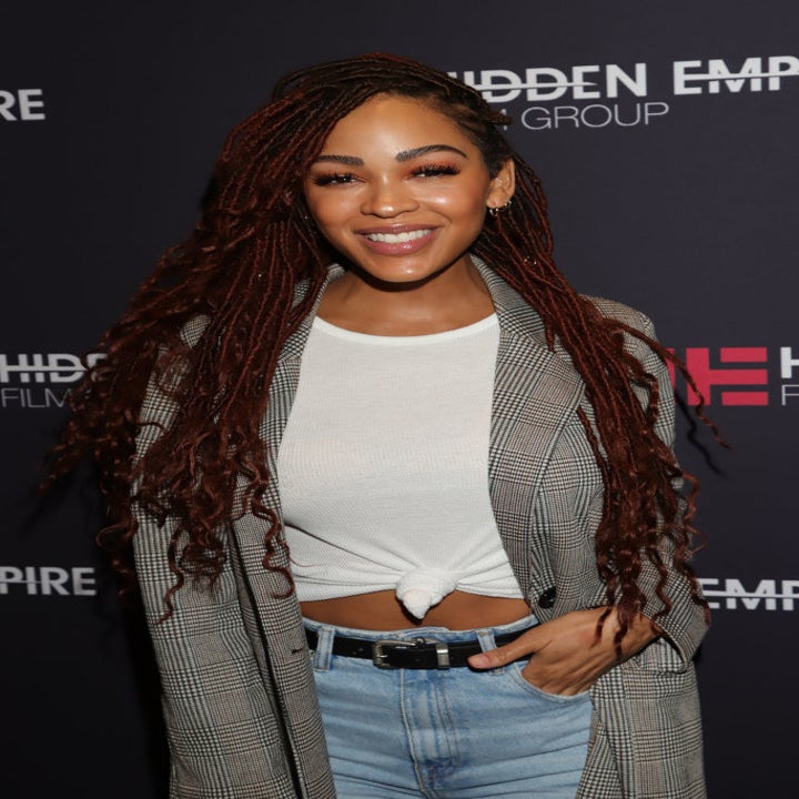 Megan in jeans and a t-shirt at an event