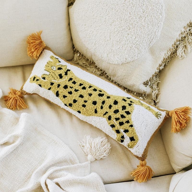 long leopard pillow with tassels