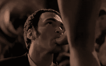 Tarantino sucking on a woman's foot/toes