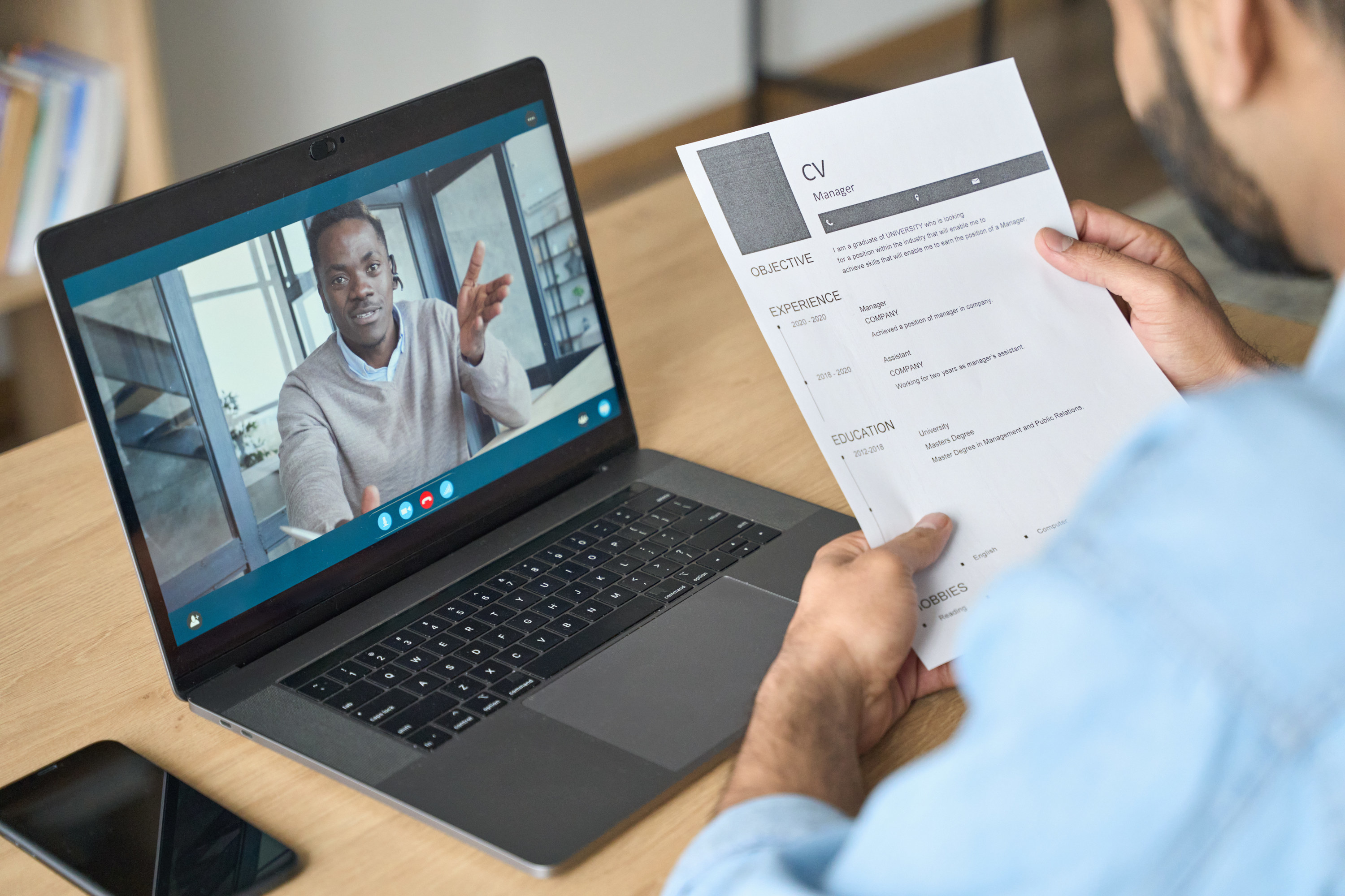 Man interviewing for a job remotely