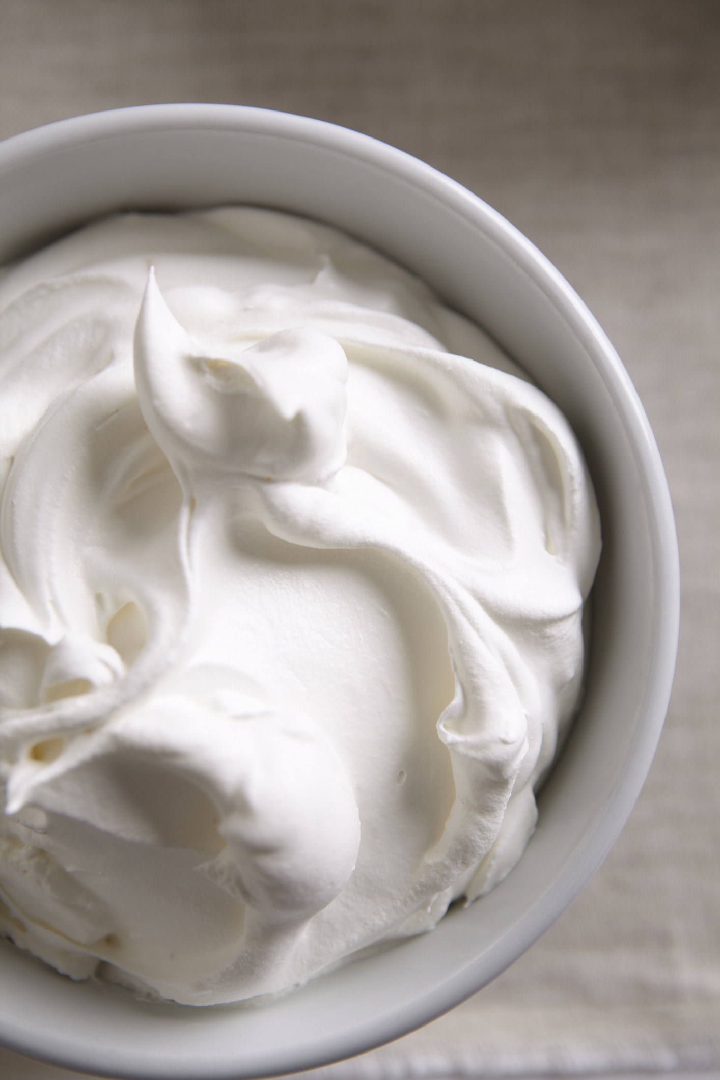 Overhead of a bowl of whipped cream