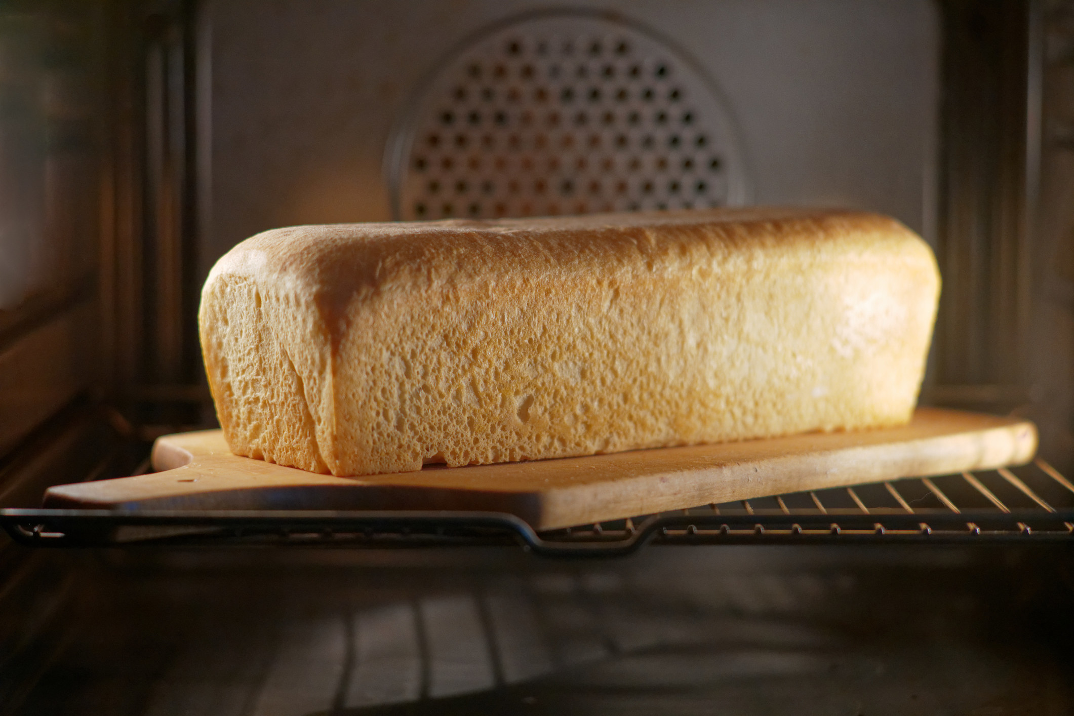 A loaf of bread in an oven.