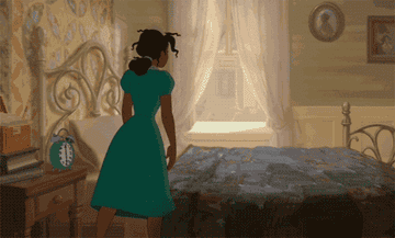GIF of Princess Tiana from Princess and The Frog plopping onto her bed