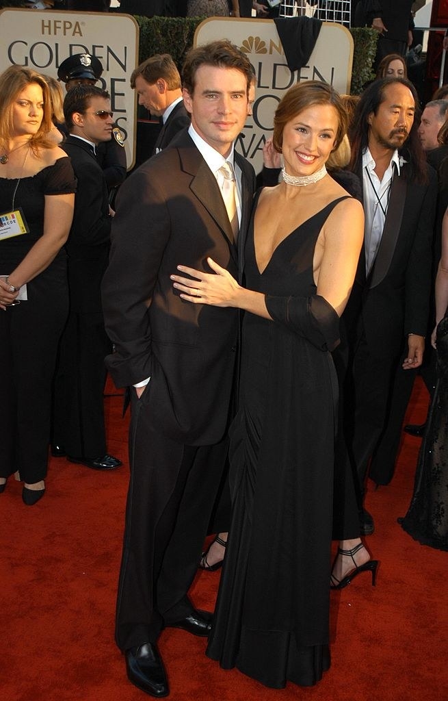 Jennifer and Scott pose together on the red carpet