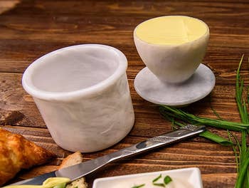 A marble butter keeper with butter inside