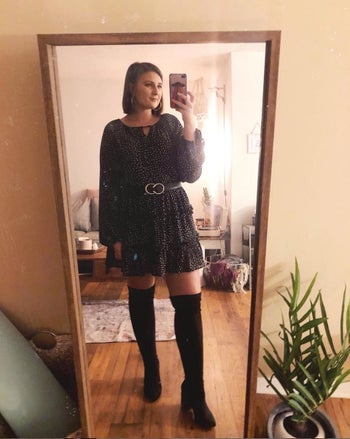 reviewer photo of them wearing black over-the-knee boots