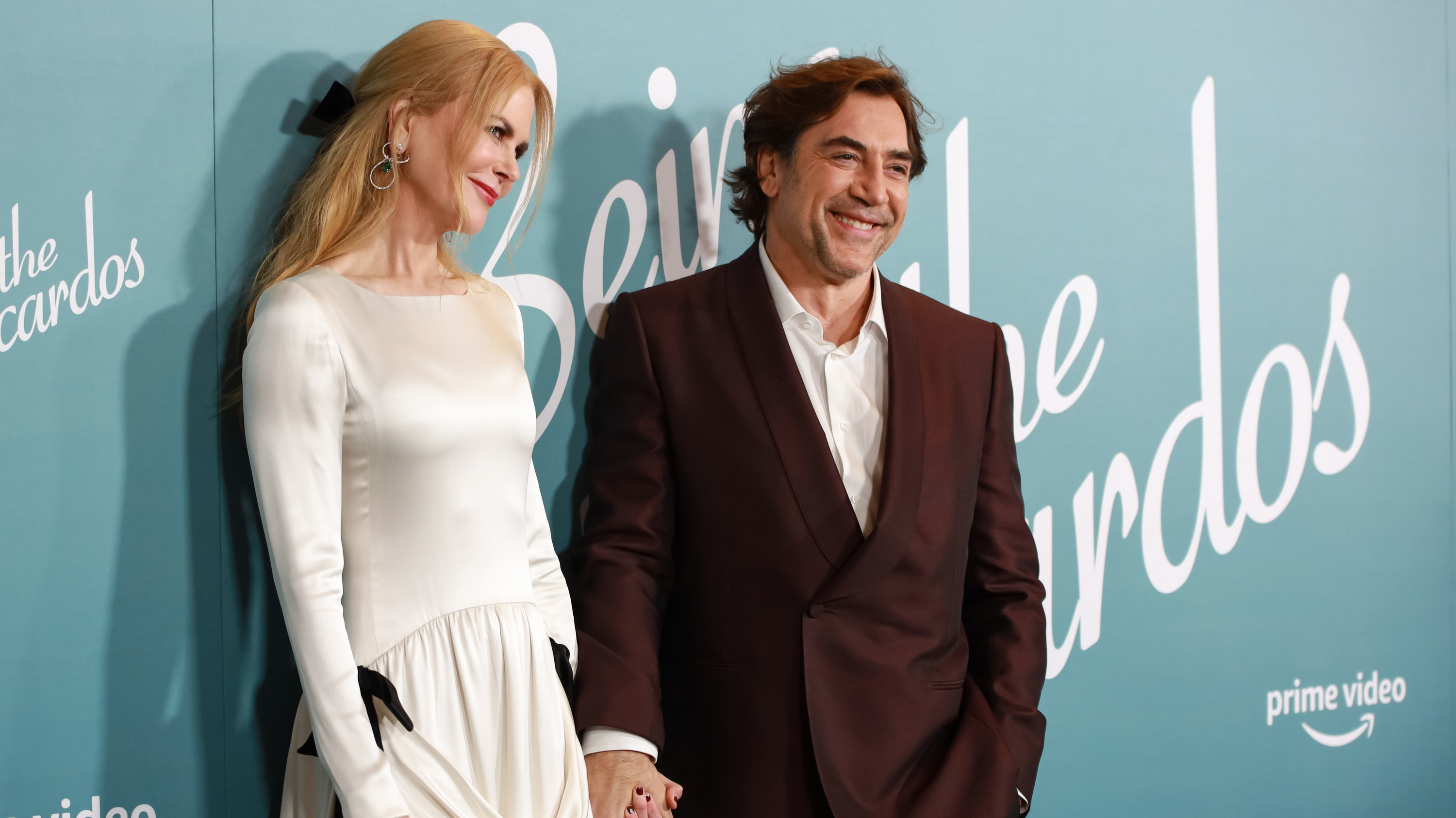 Nicole holding hands with her Being the Ricardos costar Javier Bardem at the premiere of their film