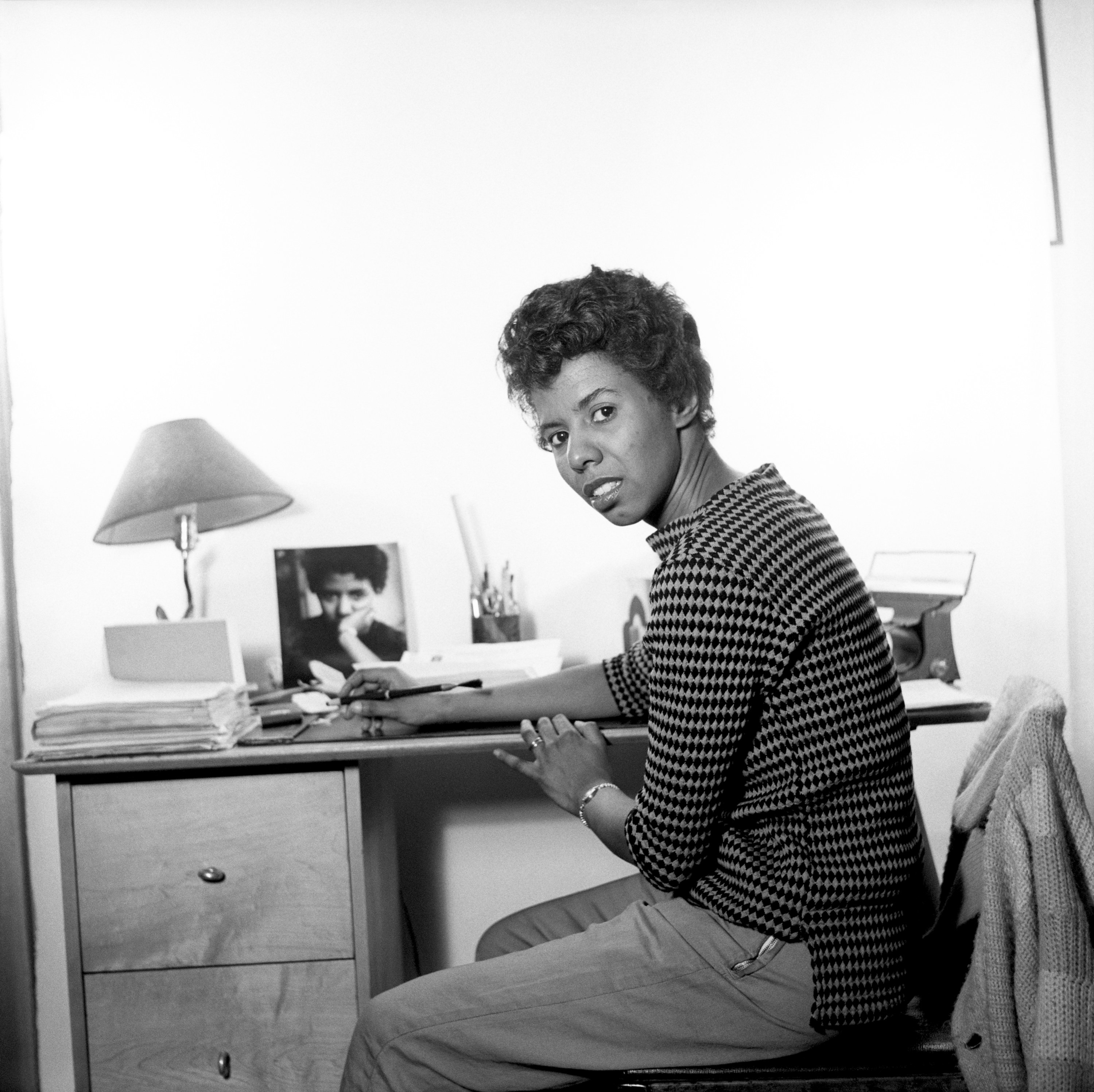 In this 1959 photo, Lorraine Hansberry sits in her New York City apartment at 337 Bleecker Street, which is where she wrote &quot;A Raisin In The Sun&quot;