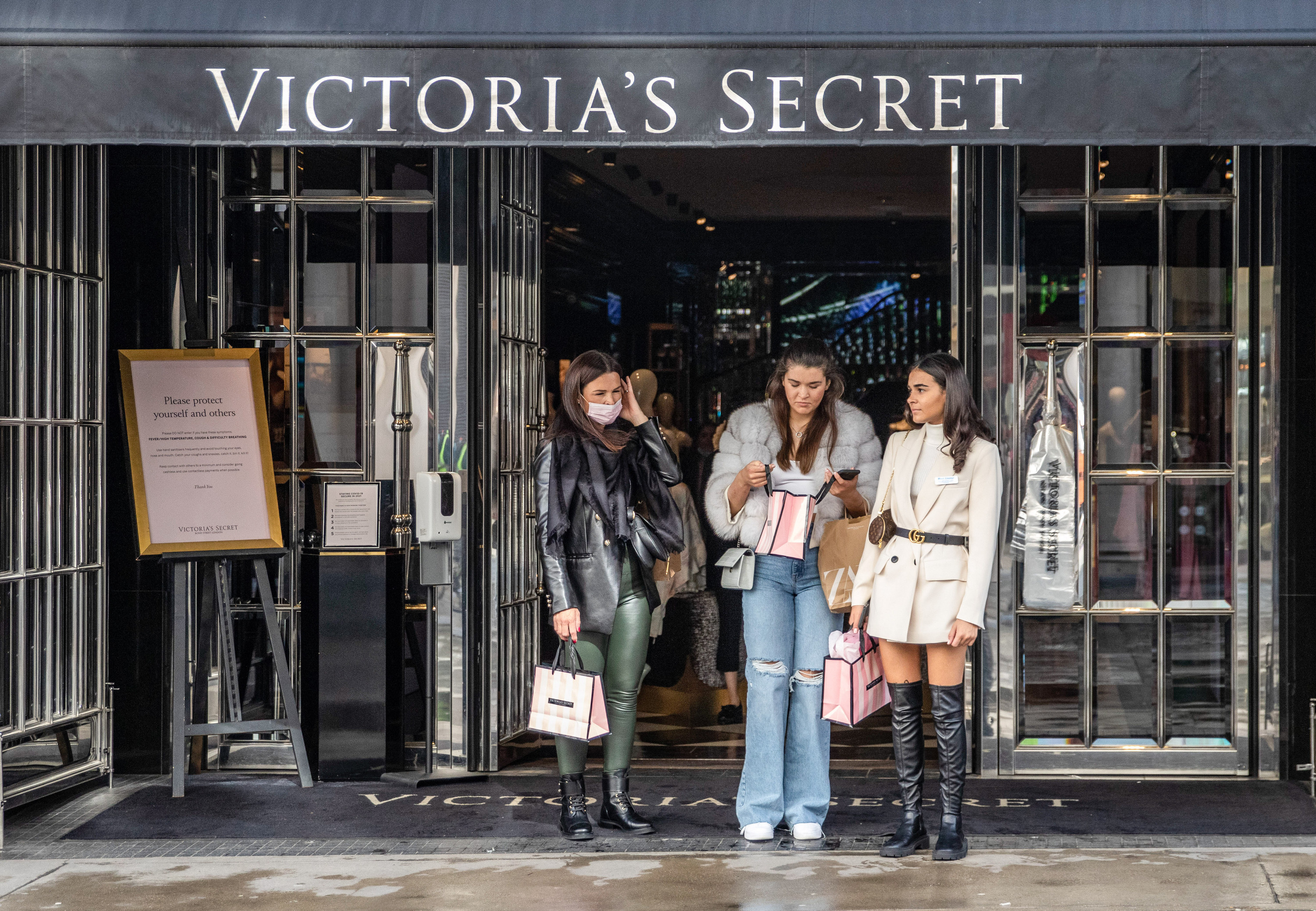 Women standing outside a Victoria&#x27;s Secret store