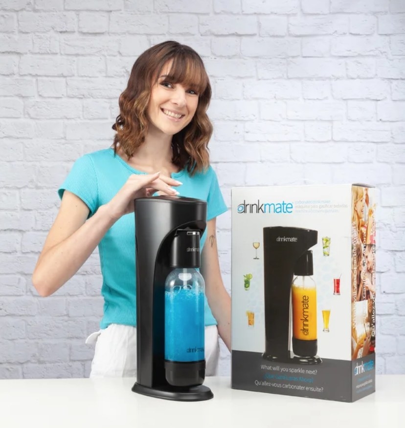 A model displaying a black soda and sparkling water machine
