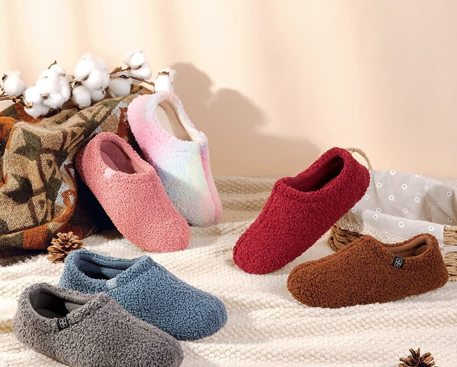 A shot of several of the fuzzy memory foam slippers in different colors